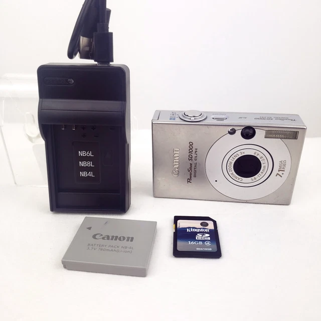 Canon PowerShot Digital ELPH SD1000 7.1MP Digital Camera 16 GB SD Card & Charger