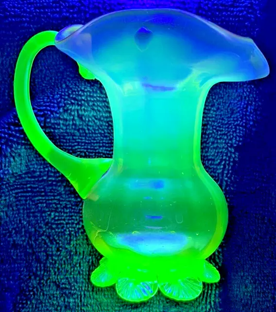 Stevens and Williams Uranium Glass cranberry fluted rim footed creamer