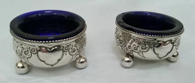A Pair Of Vintage Hallmarked Silver Salts with Blue Glass Liners -Sheffield 1883