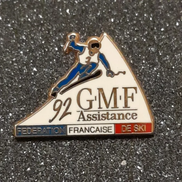 Pin’s Broche. Fédération Française De Ski. GMF Assistance. 1992