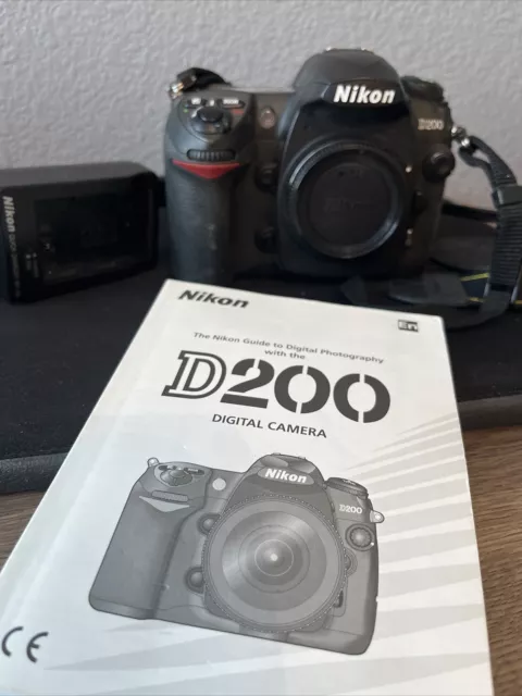 Nikon D200 10.2 MP Digital SLR Camera Black With Charger And Manual