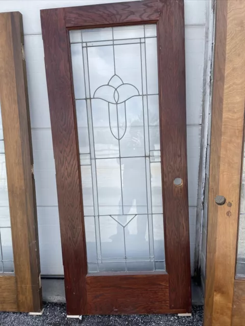 MARTOL406 Antique Oak Tulip Beveled Glass Door 33.75 X 79.5
