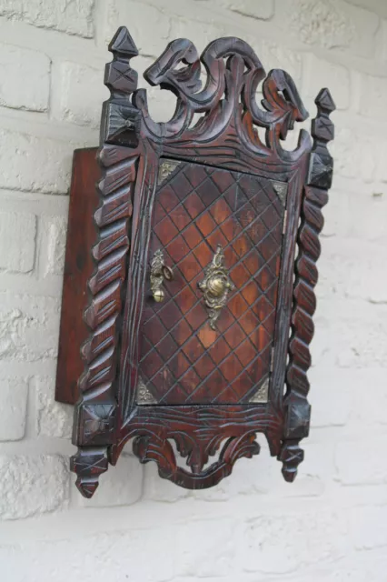 Antique apothecary wall wood carved cabinet black forest carving