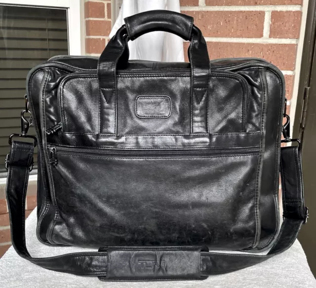 TUMI Alpha all black leather org’r-laptop brief: 6”x13”x17.5”, w/ shoulder strap