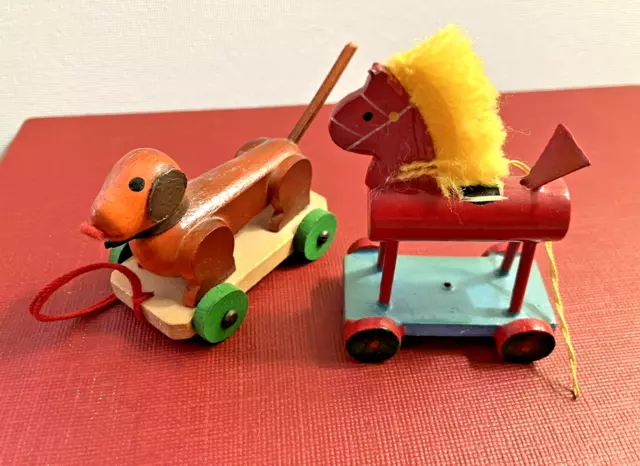 Two Handmade Vintage Christmas Wood Ornaments Horse w/ Yarn Mane & Dog on Wheels