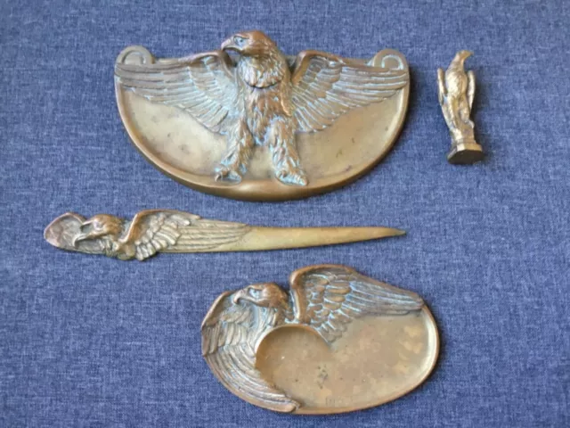 Lot -Bronze  cendrier, vide-poche, coupe papier, cachet aigle signés Frécourt