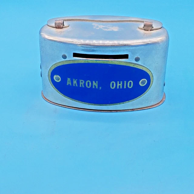 METAL OVAL COIN bank text Akron Ohio mfg by Banthrico no Key  