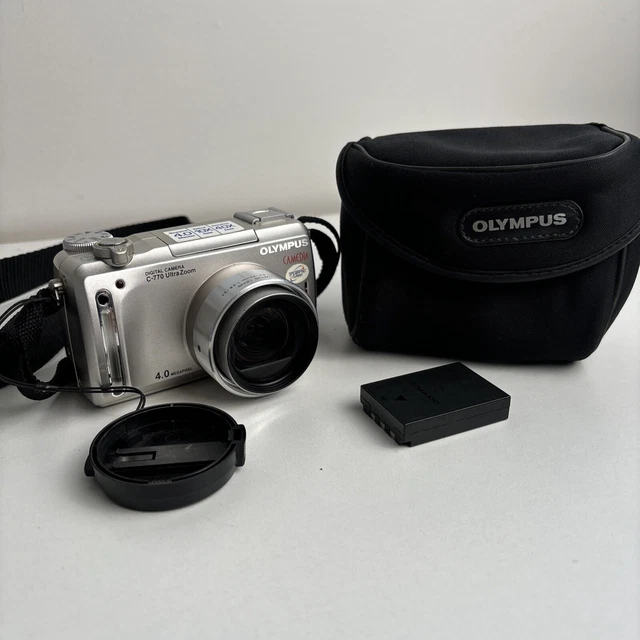 OLYMPUS C770 ULTRA Zoom Digital Camera with Battery Case And Strap 10x