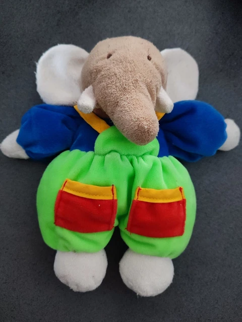 doudou peluche elephant grelot vert bleu rouge jaune ajena 20cm