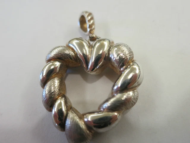 A Sterling Heart Shape  Pendent Designers Piece Vintage Piece