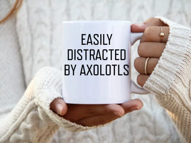 https://www.picclickimg.com/i0UAAOSwIm9lFPo3/Easily-Distracted-By-Axolotls-Mug-Ceramic-Mug.webp