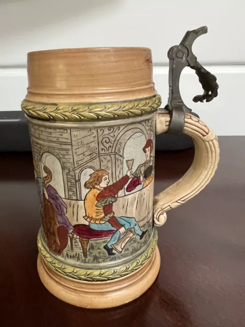 Beer stein with medeival pub scene, Made In Germany 6 Inches Tall, missing lid