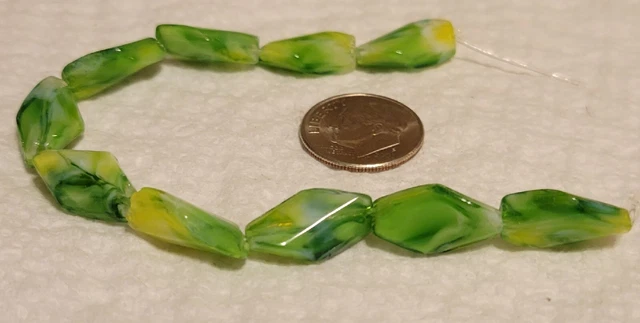 F361 16mm pressed glass twisted diamond beads. will combine to save on shipping