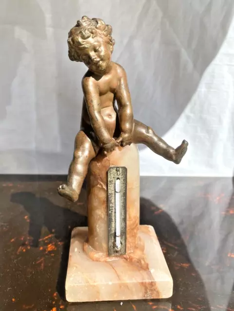 Baromètre Chérubin putti en régule sur socle en albâtre