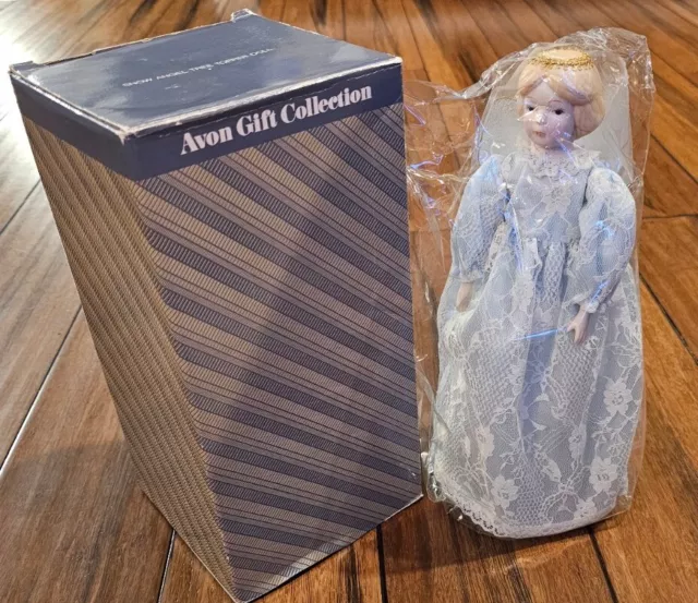 Avon snow angel tree topper best sale doll