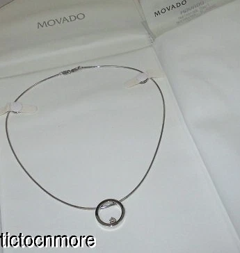 MOVADO 18K WHITE GOLD ONO PENDANT SINGLE DIAMOND CIRCLE NECKLACE .25ct DIAMOND MOVADO 18K WHITE GOLD ONO PENDANT SINGLE DIAMOND CIRCLE NECKLACE .25ct DIAMOND
