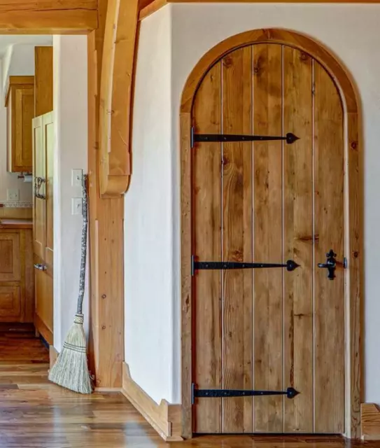 Rustic reclaimed lumber arch door solid plank wood wine cellar castle iron