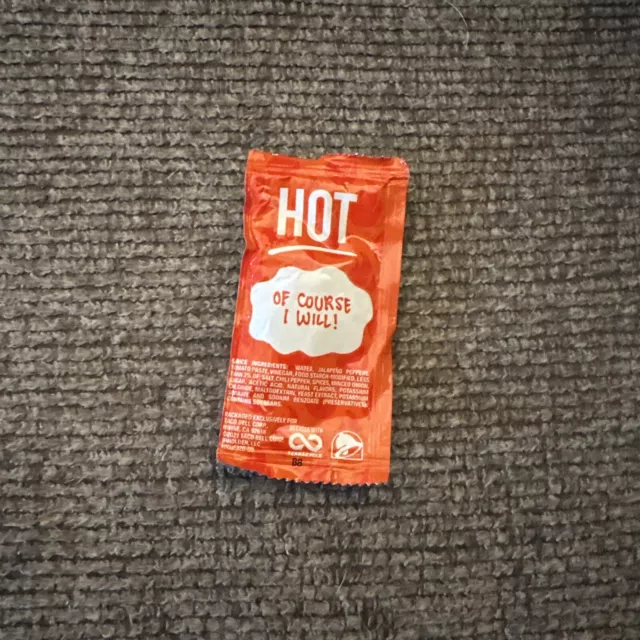 EMPTY SEALED DEFECTIVE Taco Bell Hot Sauce Single Packet .Has Air In It No Sauce