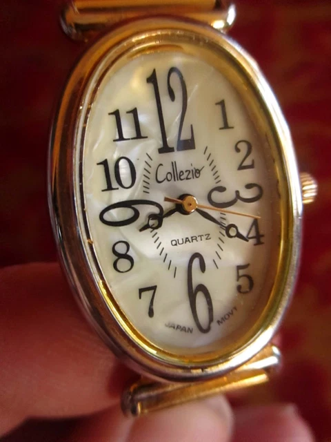 Women's stretch band goldtone Oval Japan Mvmt Quartz fashion watch NEEDS BATTERY