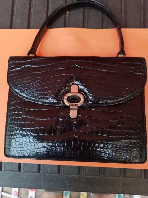 Borsa gucci clearance coccodrillo vintage prezzo