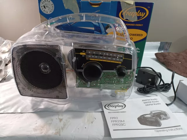 FREEPLAY WIND UP SOLAR RADIO FPR2 Solar W/ ORIGINAL BOX. Clear Color