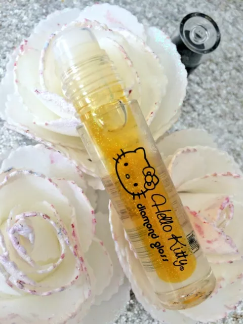 HELLO KITTY DIAMOND GLOSS AU FRUIT ROLLON LEVRES TRANSPARENT pailleté CITRON