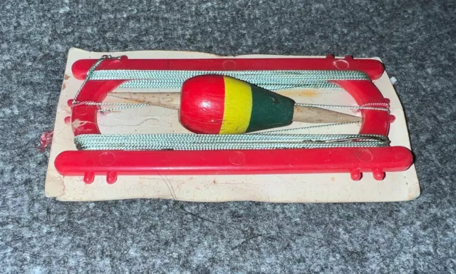 https://www.picclickimg.com/iGYAAOSwD1dk9S9X/Vintage-Hand-Lines-With-Float-Fishing-Bobber.webp