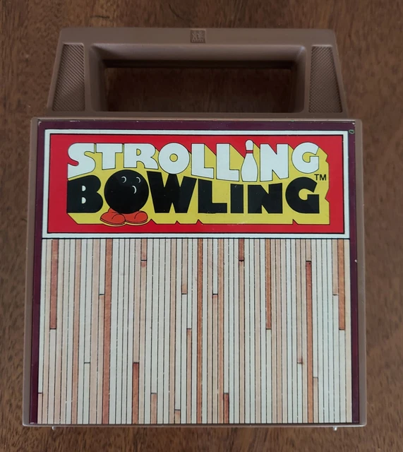 VINTAGE TOMY STROLLING Bowling Game Toy, with wind up bowling ball that