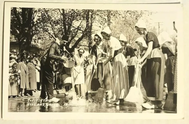 RPPC 1940s Street Scrubbing at Tulip Time Parade in Holland MI postcard A36