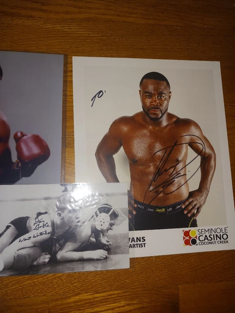 Combat Estate Autographed Lot, Joe Frazier, Dan Gable, Rashad Evans! Sold As Is Combat Estate Autographed Lot, Joe Frazier, Dan Gable, Rashad Evans! Sold As Is