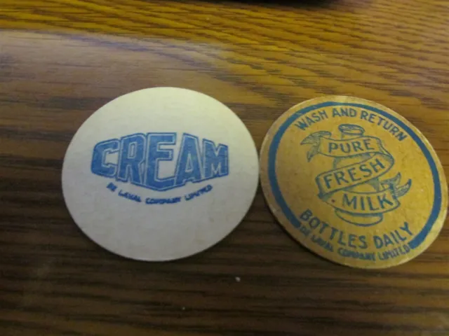 DELAVAL COMPANY LIMITED (CANADA) 2 different milk bottle caps CANADIAN ...