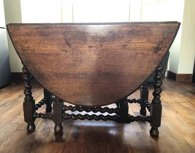 Antique oak oval dropleaf gateleg table with Barley twist legs
