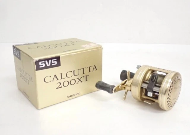 SHIMANO CALCUTTA 200XT ゴールド SHIMANO CALCUTTA 200XT Baitcasting Reel w/ Spare Handle Gold