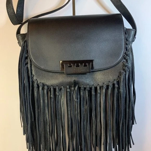Zac Posen - Eartha Iconic Accordian Purse, black leather w/ leather fringe.