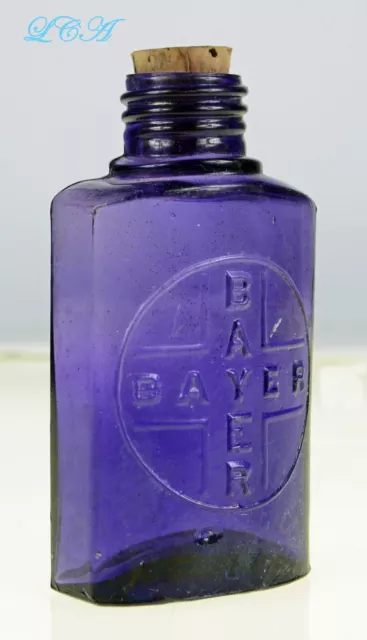 TRANSLUCENT purple BAYER ASPIRIN HEROIN antique bottle BAYER in cross BLOWN bim