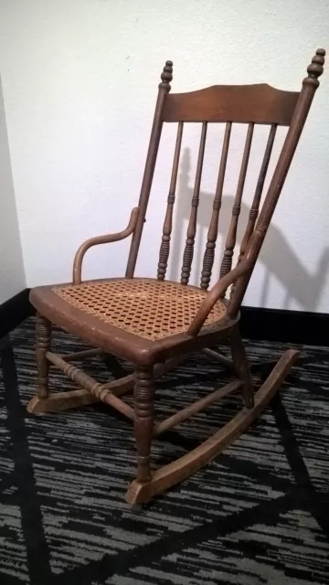 Child's antique rocking chair cane seat solid hardwood oak walnut? 12" high seat