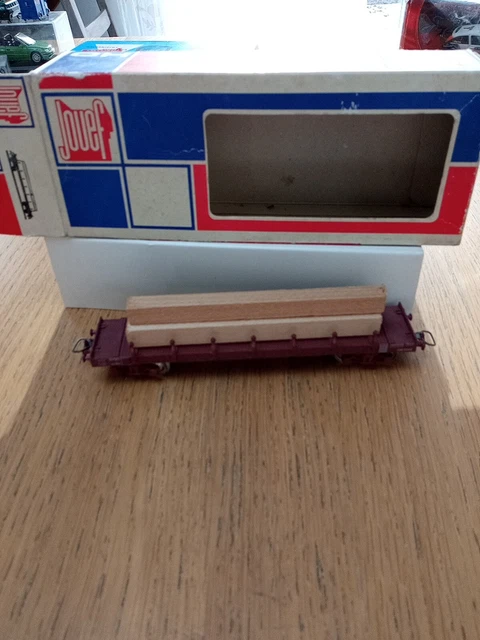 Wagon plat avec chargement de bois Qhoyw 174813 brun Jouef