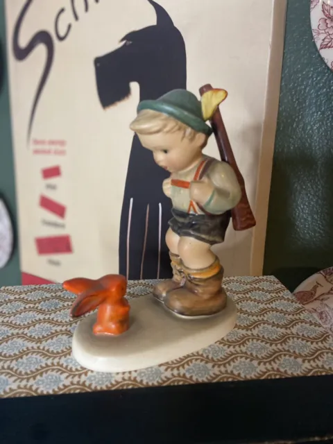 Hummel Goebel Sensitive Boy Hunter with Rabbit Figurine.