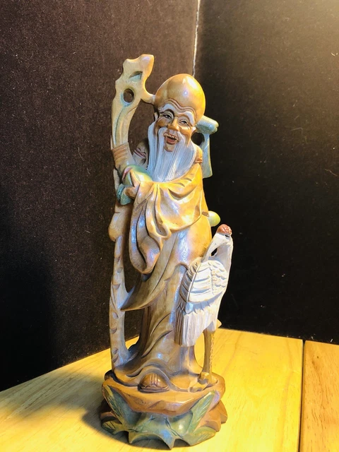 Wood carved statue of Tao god of longevity Shou Lao. 10”