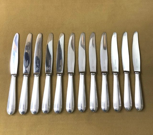 12 couteaux à entremet en métal argenté Christofle alfénide