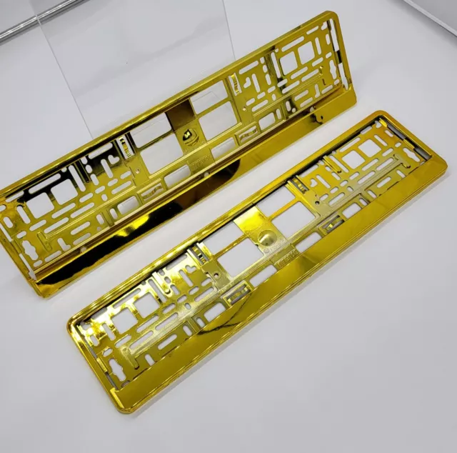 2 Piece License Plate Holder Gold - Surrounds Vehicle Mount