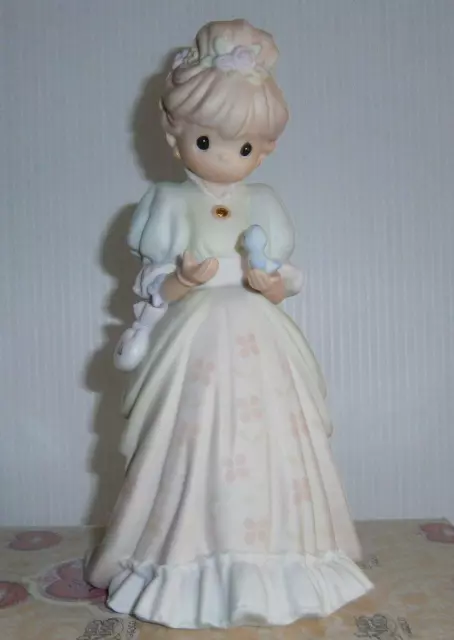 LARGE PRECIOUS MOMENTS  VICTORIAN LADY WITH BIRD  "Charity Begins In The Heart"
