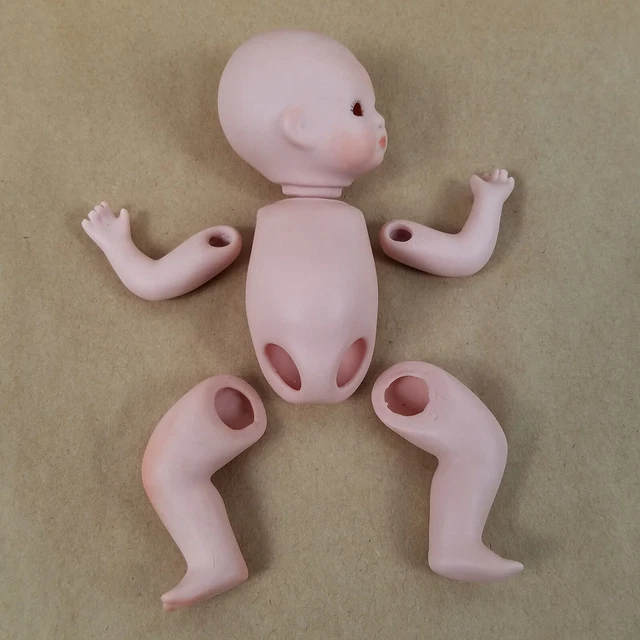 Bisque Porcelain 5" Baby Doll marked Copr Grace S Putnam, Germany No Eyes
