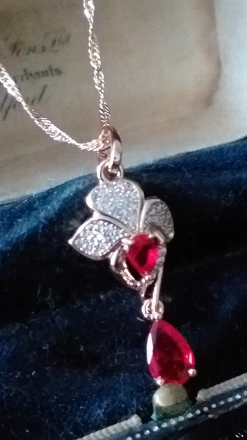 Ciondolo portafoto locket ovale con motivo floreale color bronzo