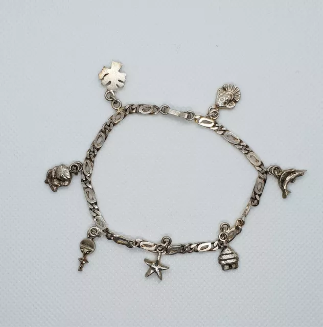 Bracelet en argent massif 925 avec des charmes RefM674