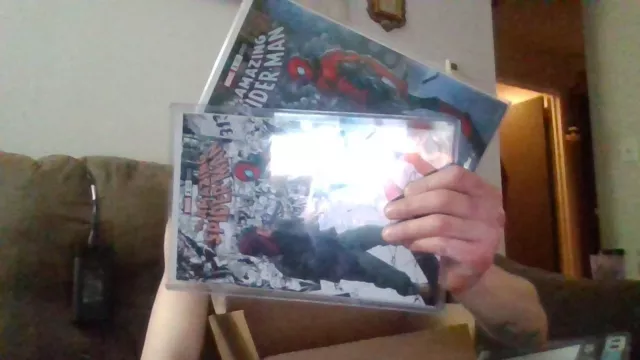 eminem spiderman comic spotlight variant 9.8 2 BOOK LOT