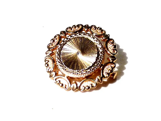 Broche ancienne fleur ciselée or diamants