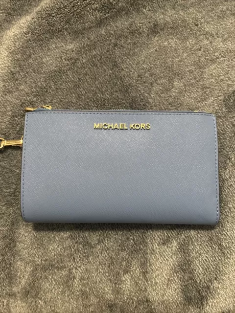 Woman’s Michael Kors wallet Blue (darker In Person)