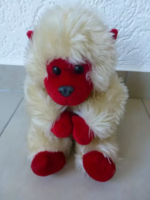 Plüsch Figur  Affe  sitzend beige - rot  ca.  20 cm