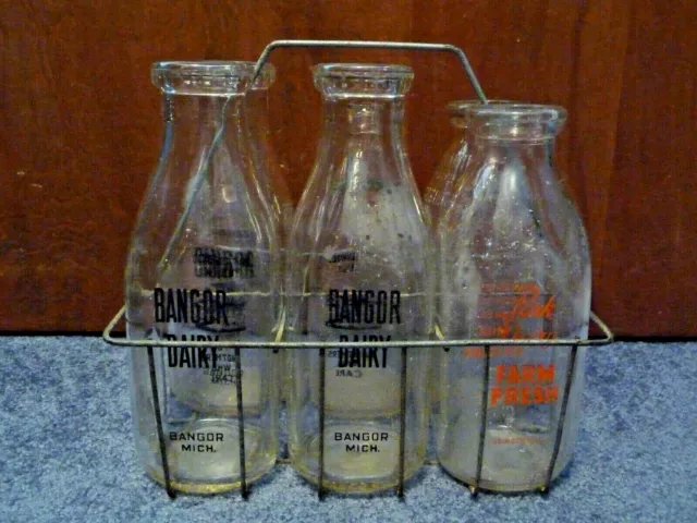 https://www.picclickimg.com/idYAAOSwUqpg3OyU/6-Vintage-Michigan-Glass-Milk-Bottles-1-Quart.webp
